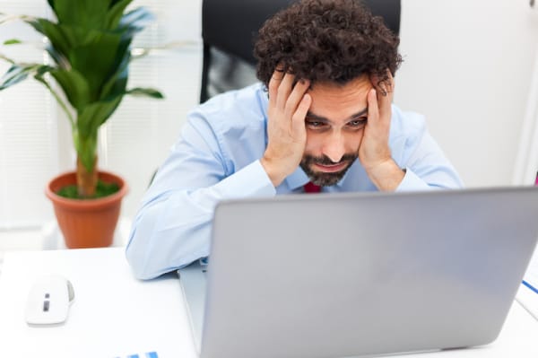RIA-Stressed-At-Computer